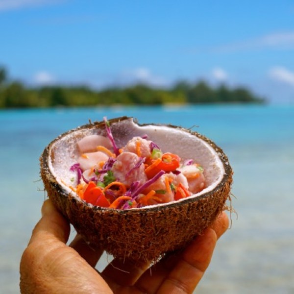 a hand holding a water bottle