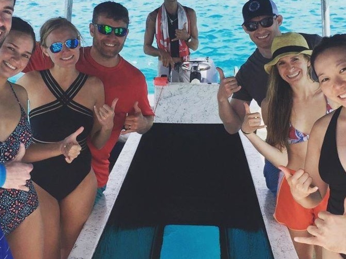 a group of people posing for the camera