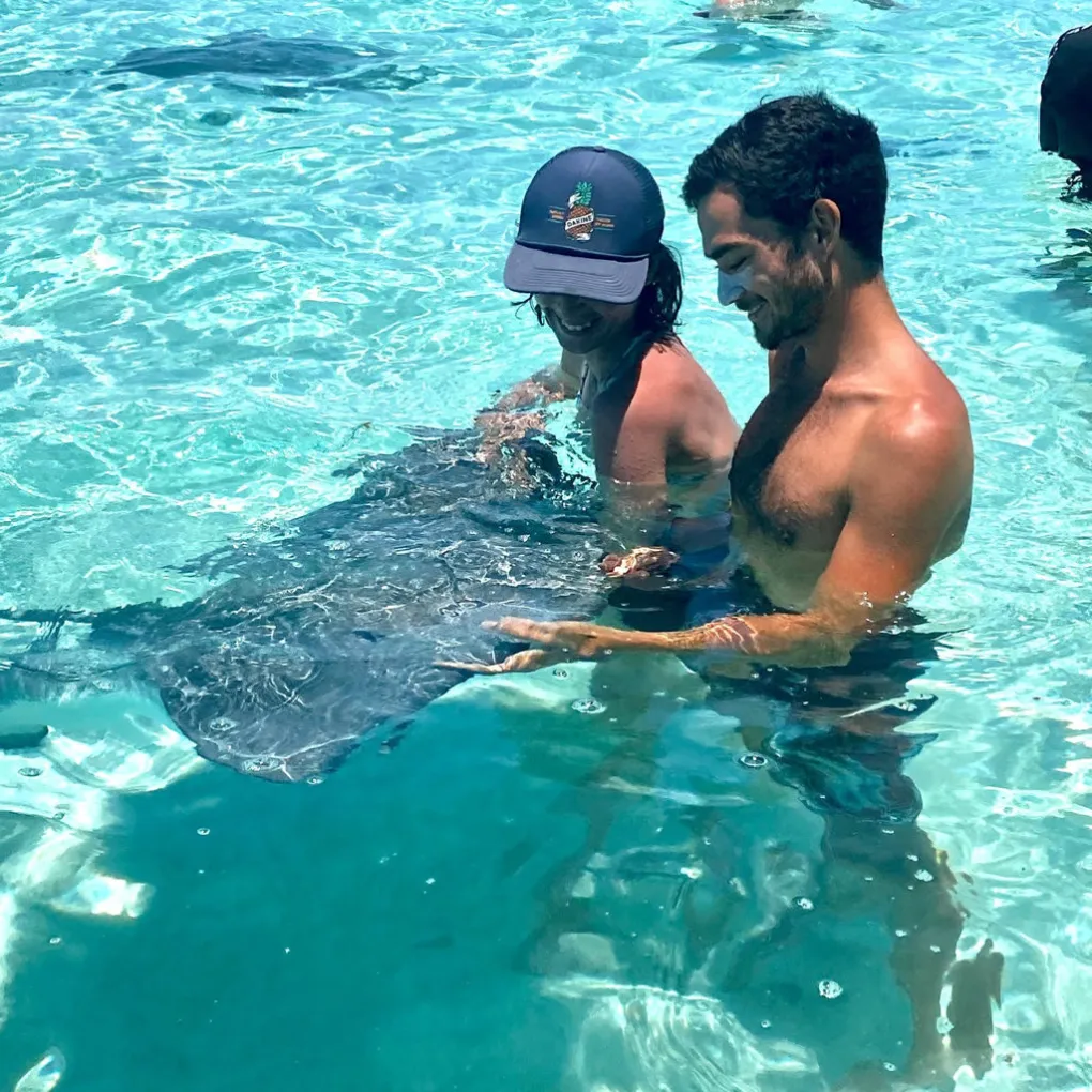 a man swimming in a pool of water